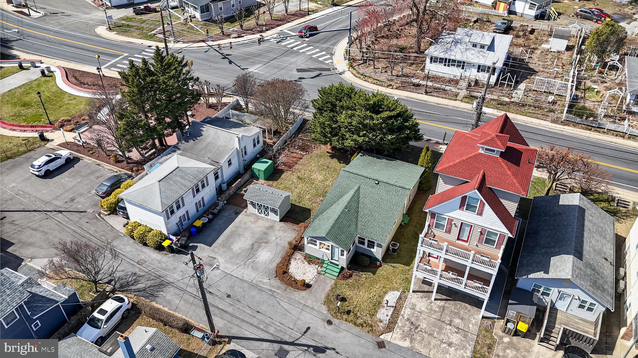 8227 Bayside Road Chesapeake Beach, MD 20732 - Photo 2 of 27 an aerial view of residential houses with outdoor space