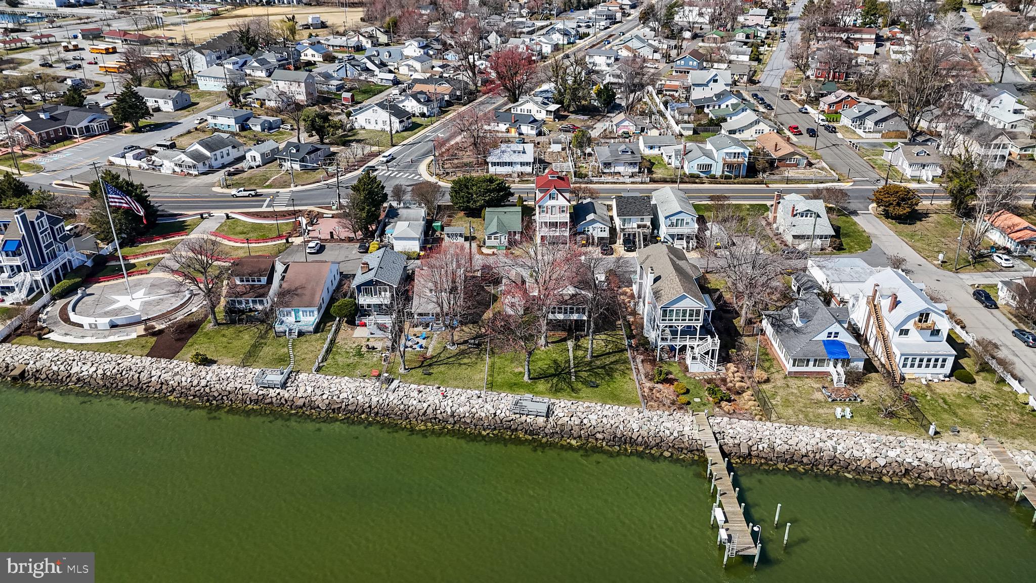 8227 Bayside Road Chesapeake Beach, MD 20732 - Photo 27 of 27 an aerial view of residential houses with outdoor space and swimming pool