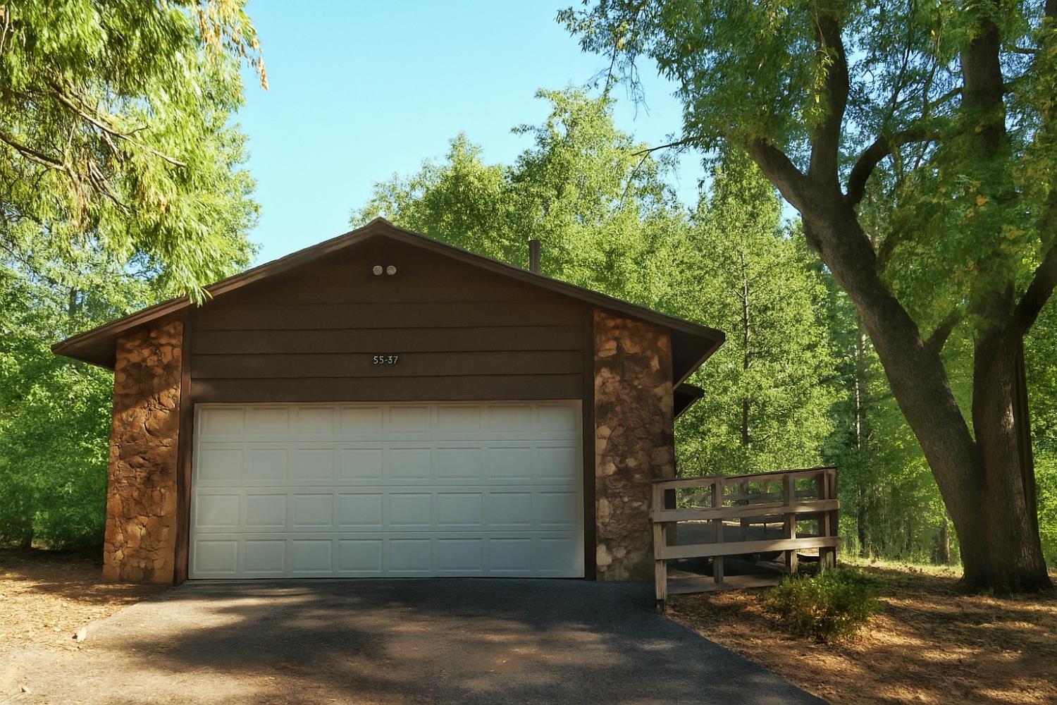a front view of a house with a garage