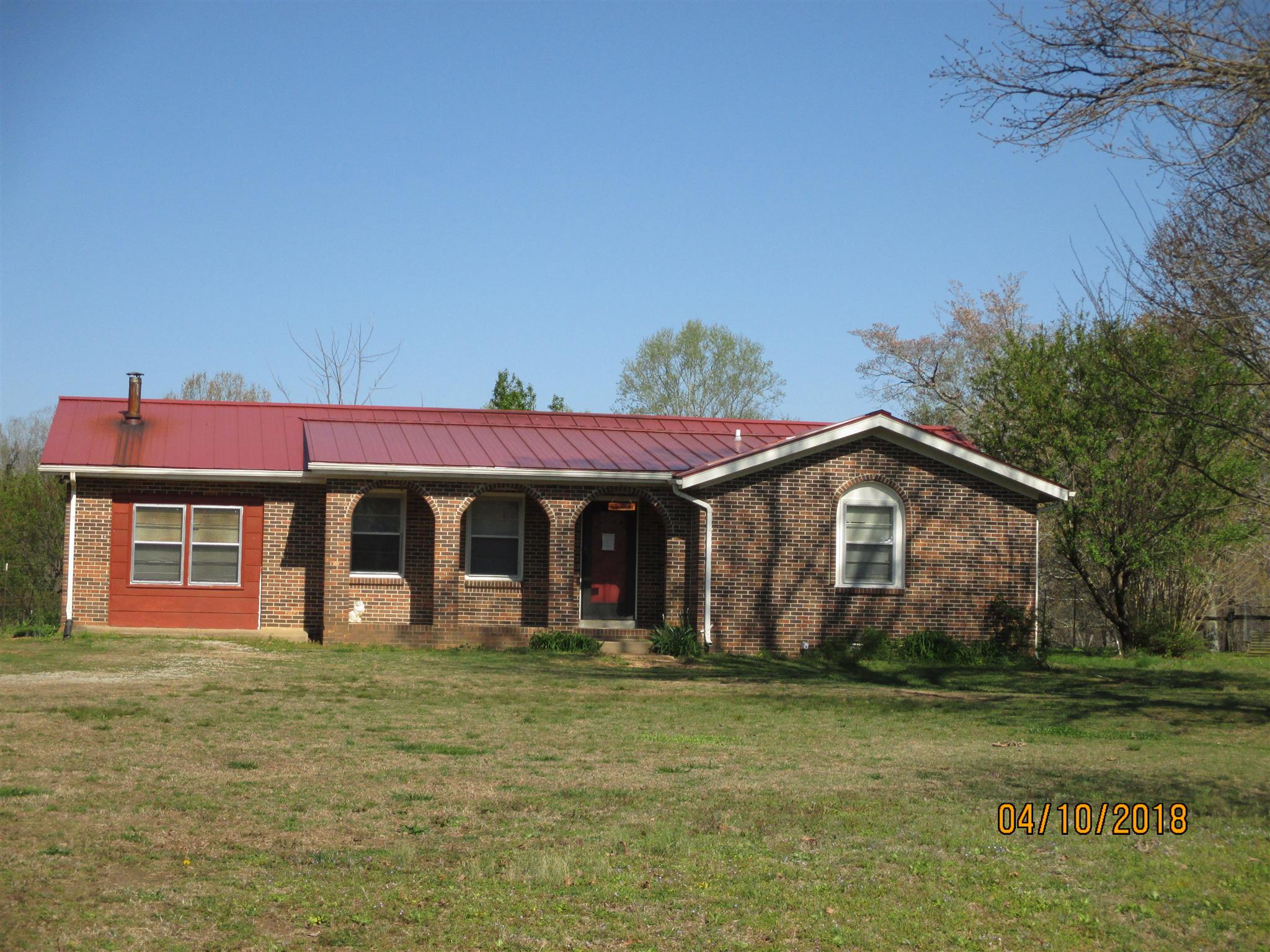 1468 Oak Grove Road Goodspring, TN 38460 - Photo 2 of 10 a view of a house with a yard