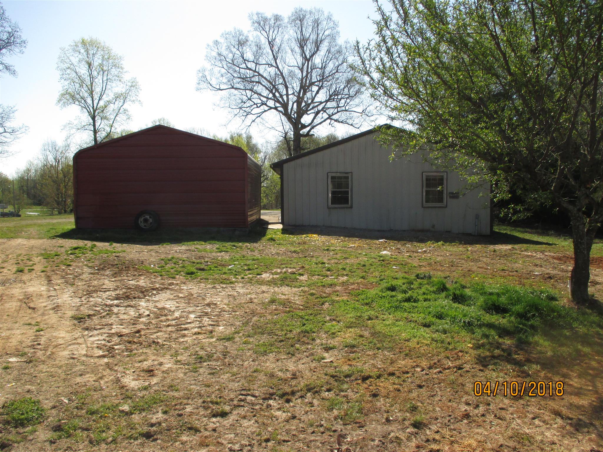 1468 Oak Grove Road Goodspring, TN 38460 - Photo 5 of 10 a view of a house with a yard