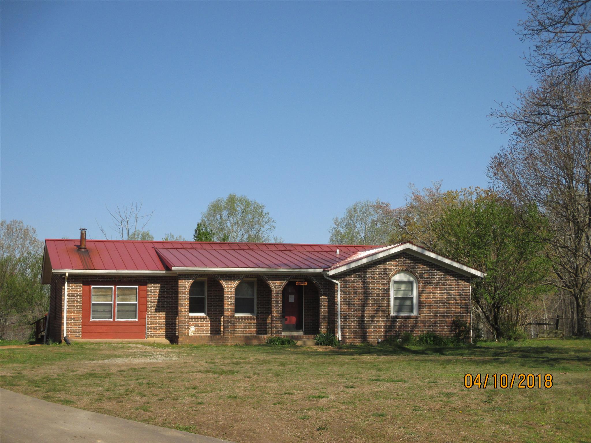 1468 Oak Grove Road Goodspring, TN 38460 - Photo 8 of 10 a front view of a house with a yard