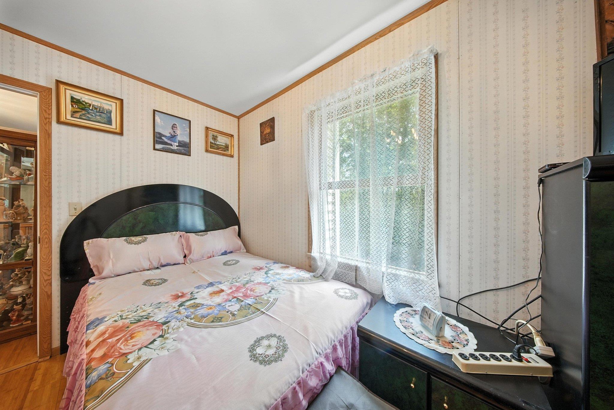 10 Hoffman Road Hankins, NY 12741 - Photo 19 of 30 a bedroom with a bed and a window