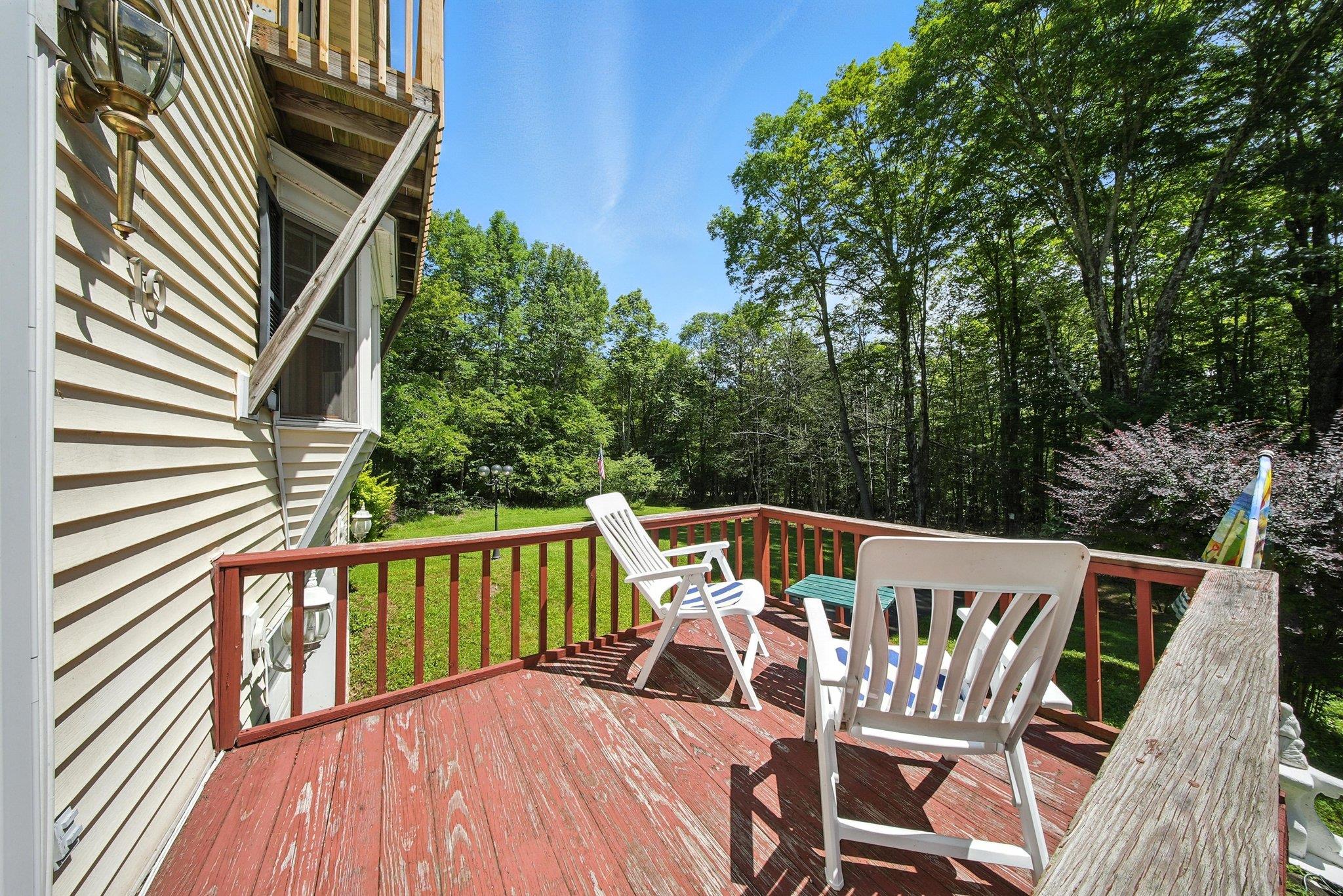 10 Hoffman Road Hankins, NY 12741 - Photo 24 of 30 a view of deck with furniture and trees around