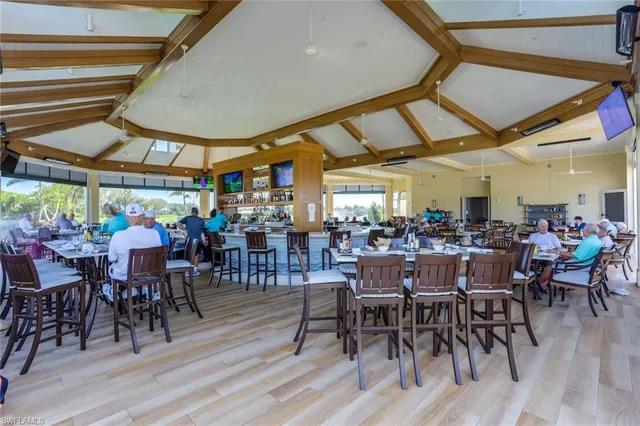 a group of people sitting in a patio