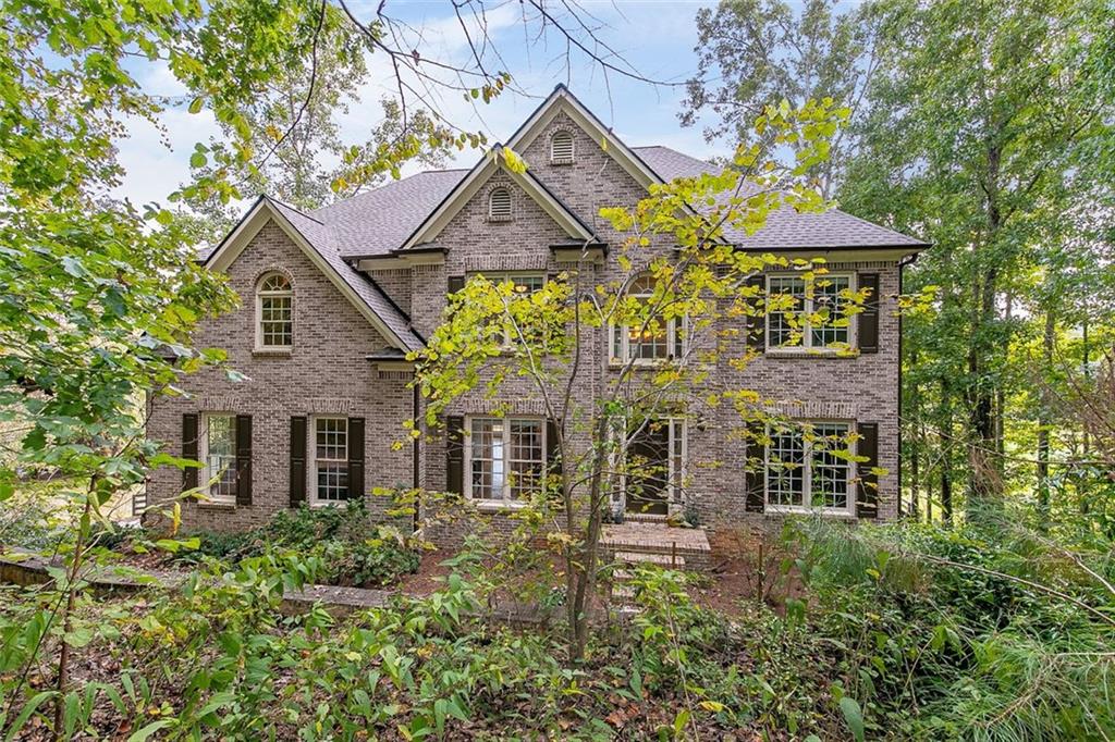 92 Bevil Ridge Road Southeast Emerson, GA 30137 - Photo 1 of 1 front view of a house with a yard