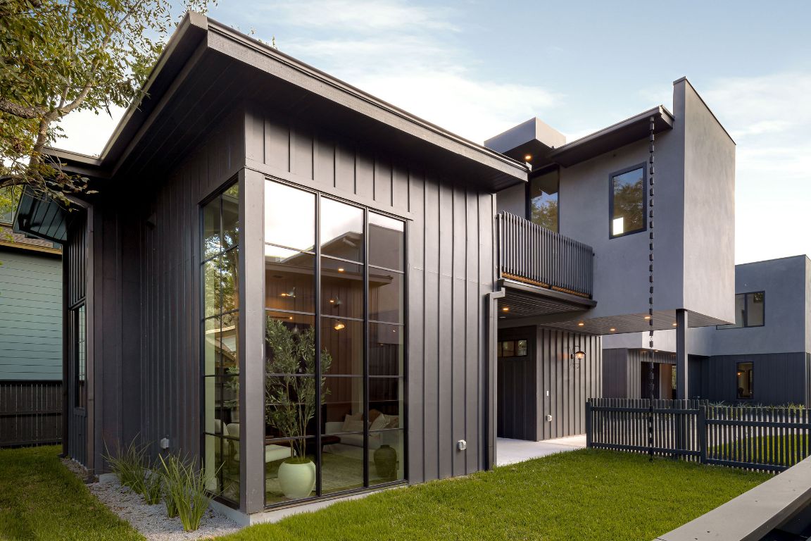 a backyard of a house with lots of green space