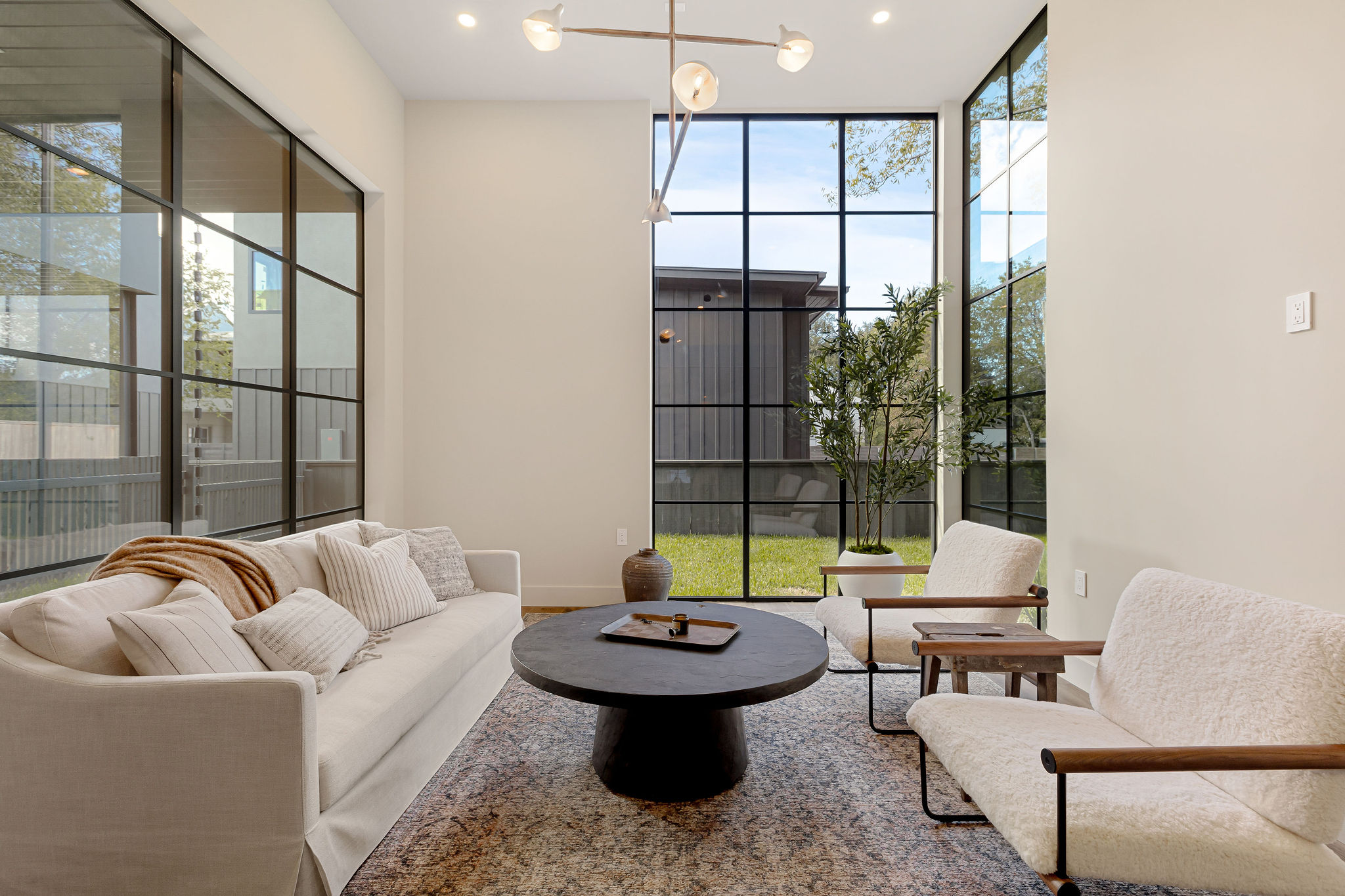 4412 Banister Lane, Unit 2 Austin, TX 78745 - Photo 7 of 29 a living room with furniture and a large window