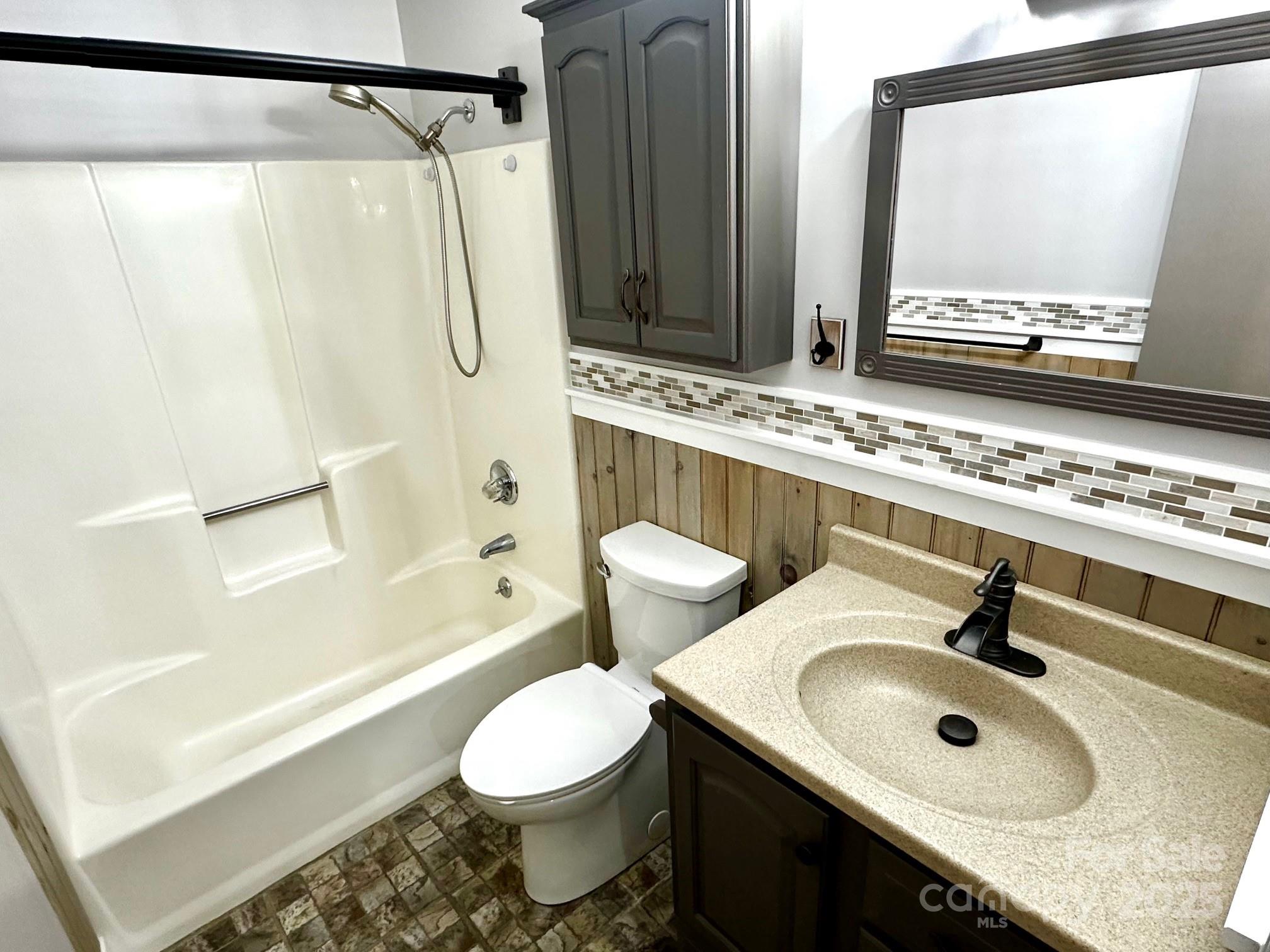 3 Rocking Porch Road Asheville, NC 28805 - Photo 22 of 25 a bathroom with a sink and a mirror