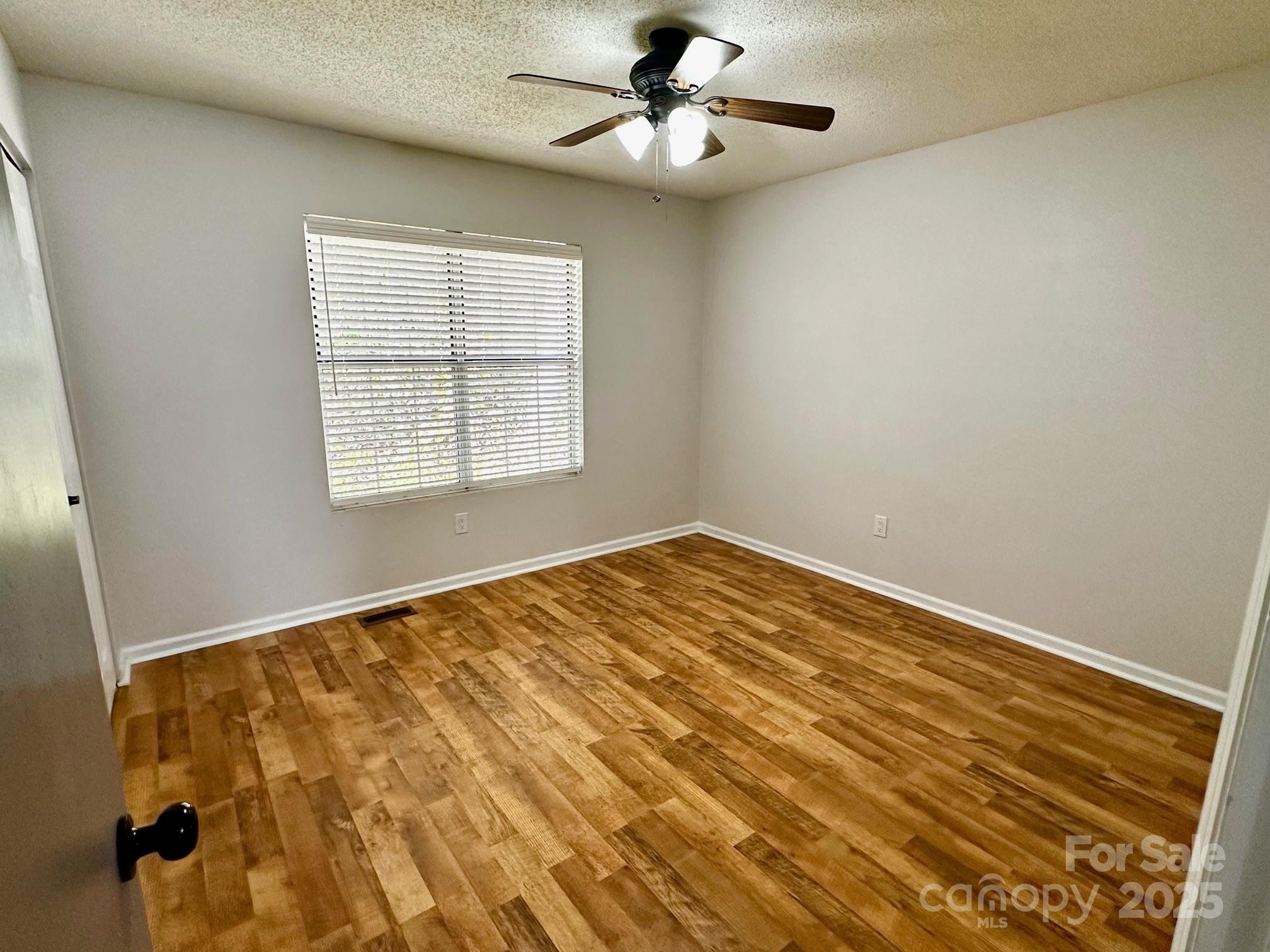 3 Rocking Porch Road Asheville, NC 28805 - Photo 24 of 25 a view of an empty room with a window