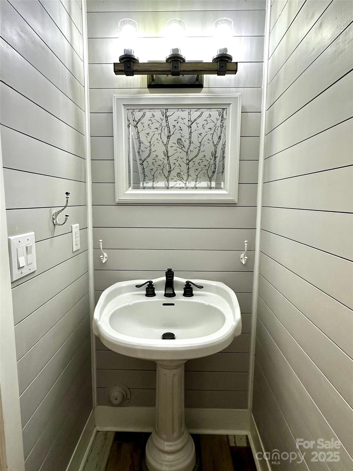 3 Rocking Porch Road Asheville, NC 28805 - Photo 10 of 25 a bathroom with a sink and a mirror