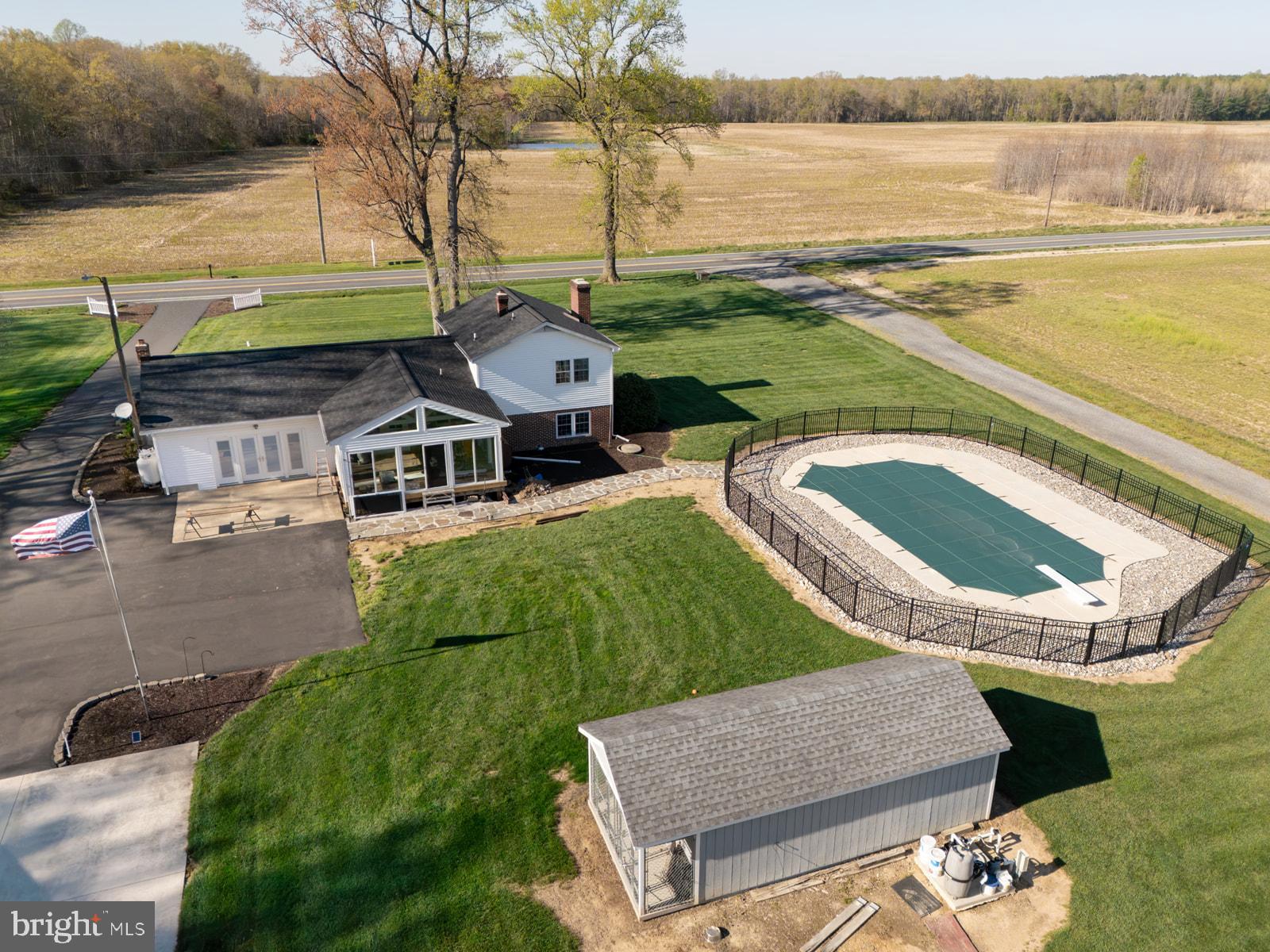 34203 Cypress Road Millington, MD 21651 - Photo 18 of 30 a swimming pool with outdoor seating and yard
