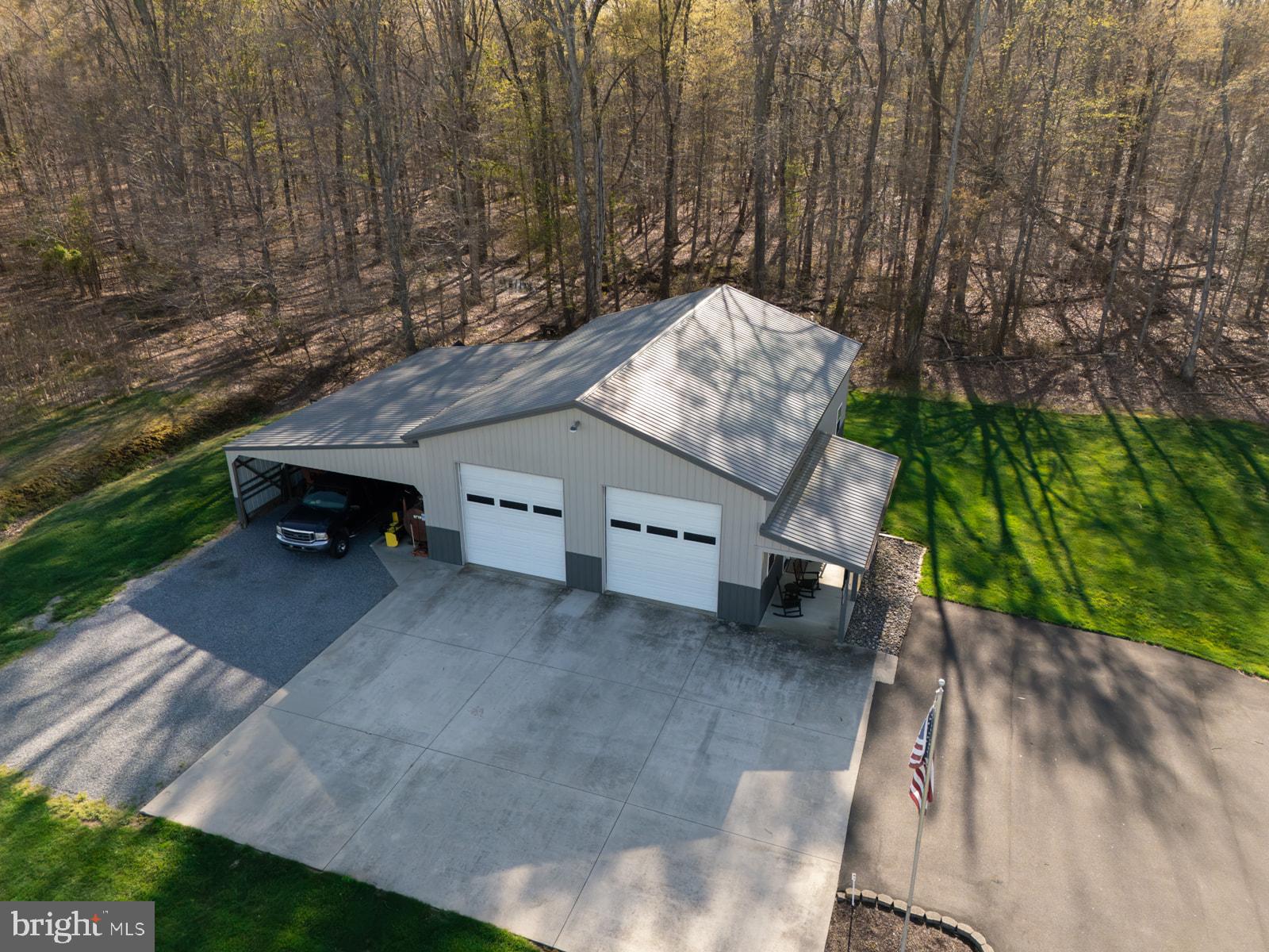34203 Cypress Road Millington, MD 21651 - Photo 21 of 30 a car parked in front of a house