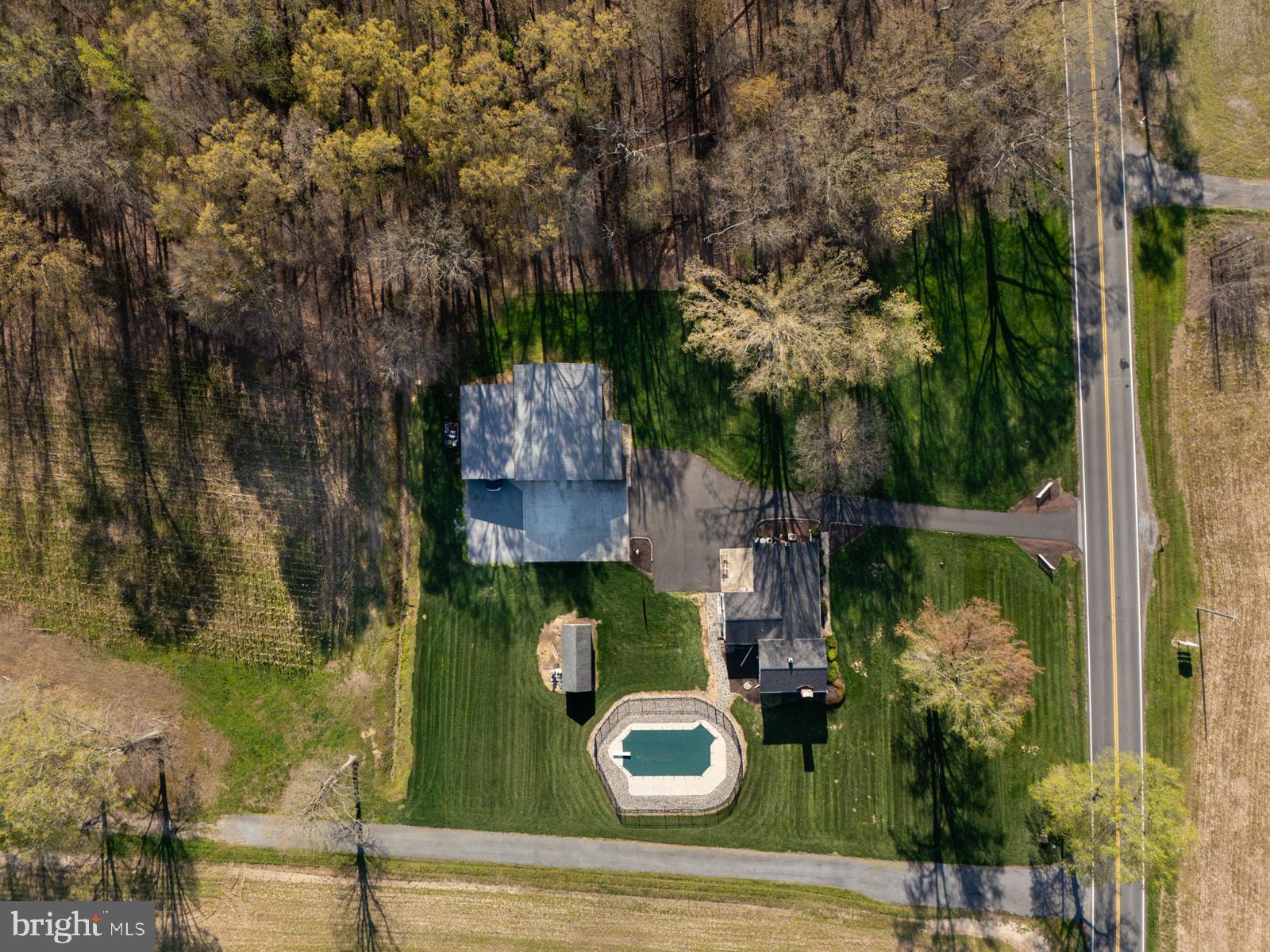34203 Cypress Road Millington, MD 21651 - Photo 24 of 30 an aerial view of a house with yard swimming pool and outdoor seating