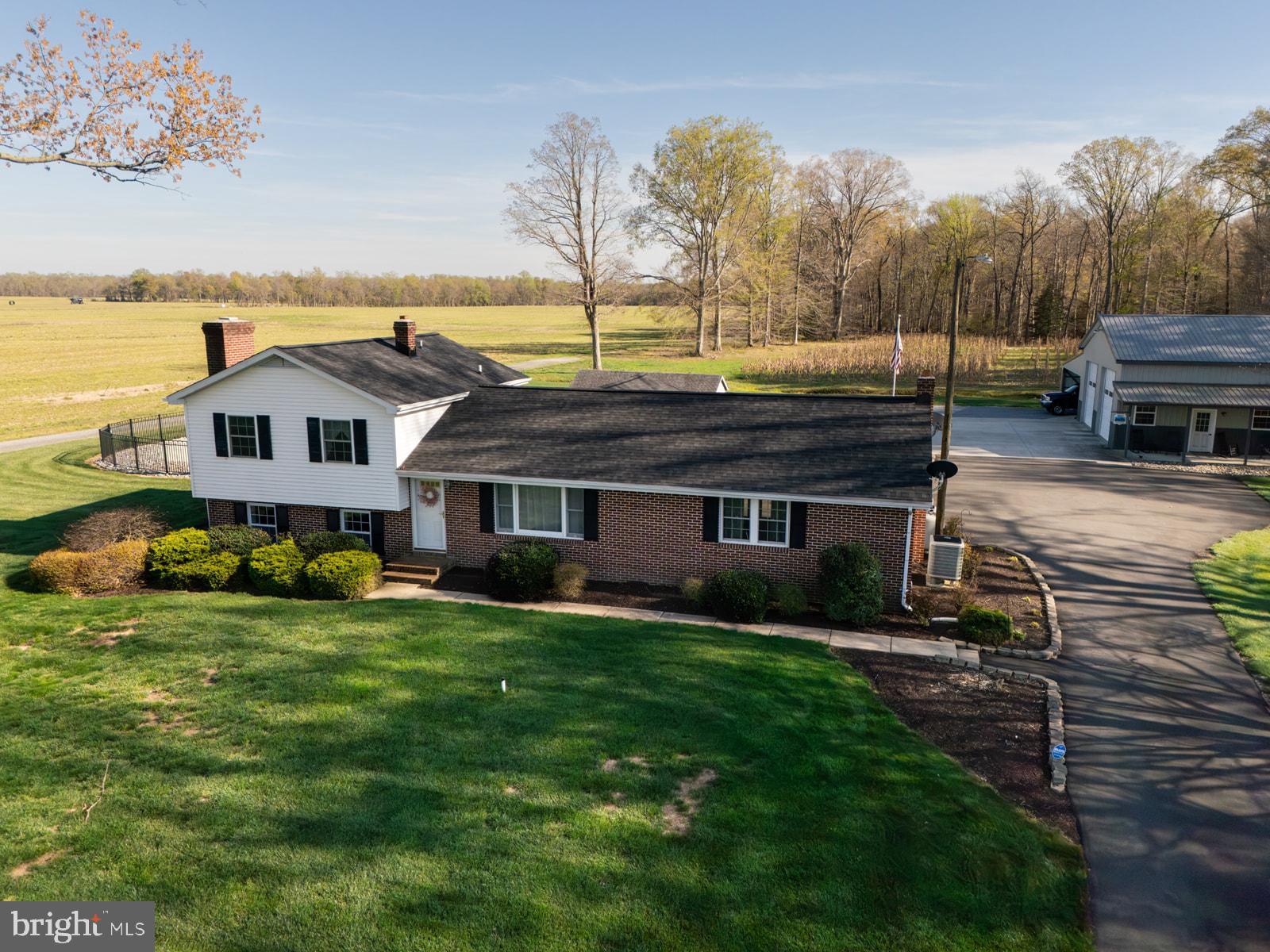 34203 Cypress Road Millington, MD 21651 - Photo 28 of 30 a view of a house with a backyard and sitting area