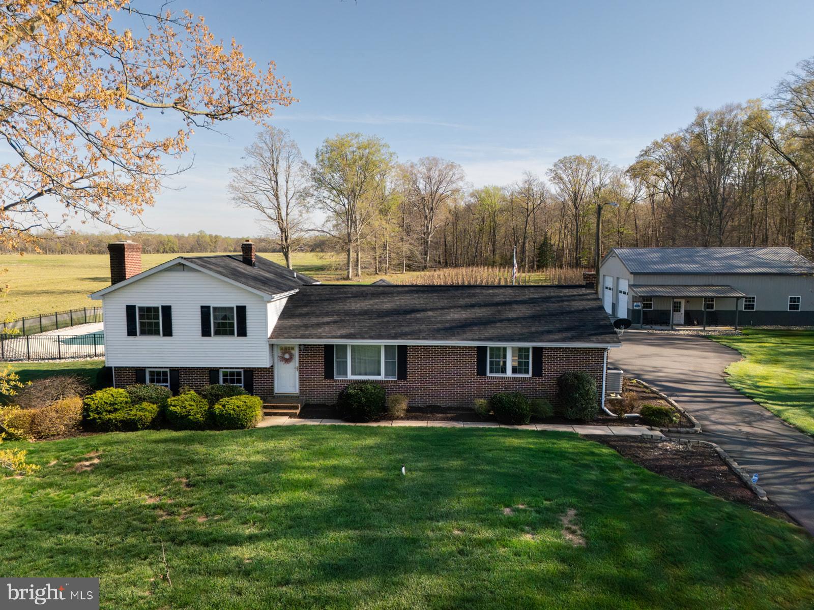 34203 Cypress Road Millington, MD 21651 - Photo 29 of 30 a view of a house with a big yard plants and large trees