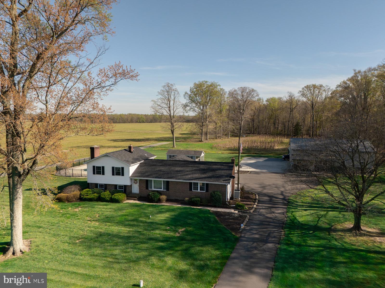 34203 Cypress Road Millington, MD 21651 - Photo 3 of 30 a view of a house with garden and sitting area