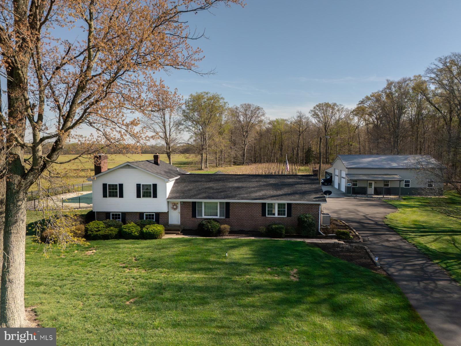 34203 Cypress Road Millington, MD 21651 - Photo 4 of 30 a front view of house with yard and green space
