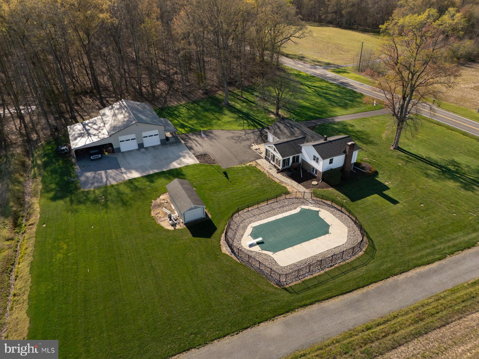 34203 Cypress Road Millington, MD 21651 - Photo 10 of 30 an aerial view of a house with garden space and street view