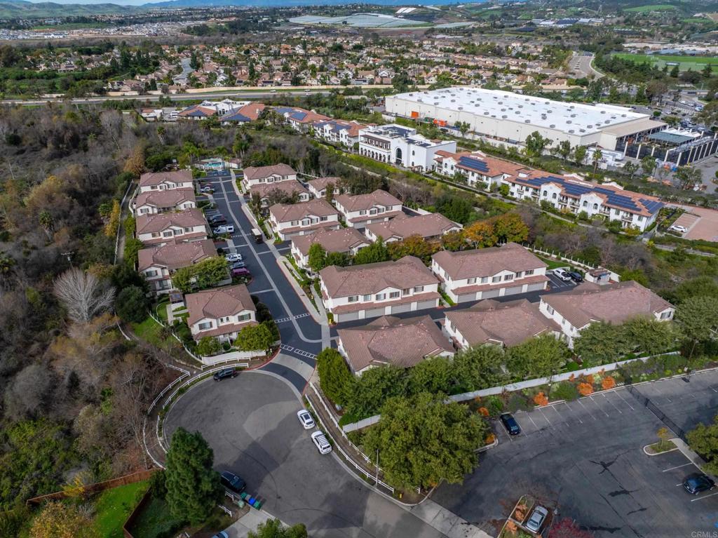5511 Old Ranch Road, Unit 19 Oceanside, CA 92057 - Photo 30 of 32 an aerial view of a city with lots of residential buildings