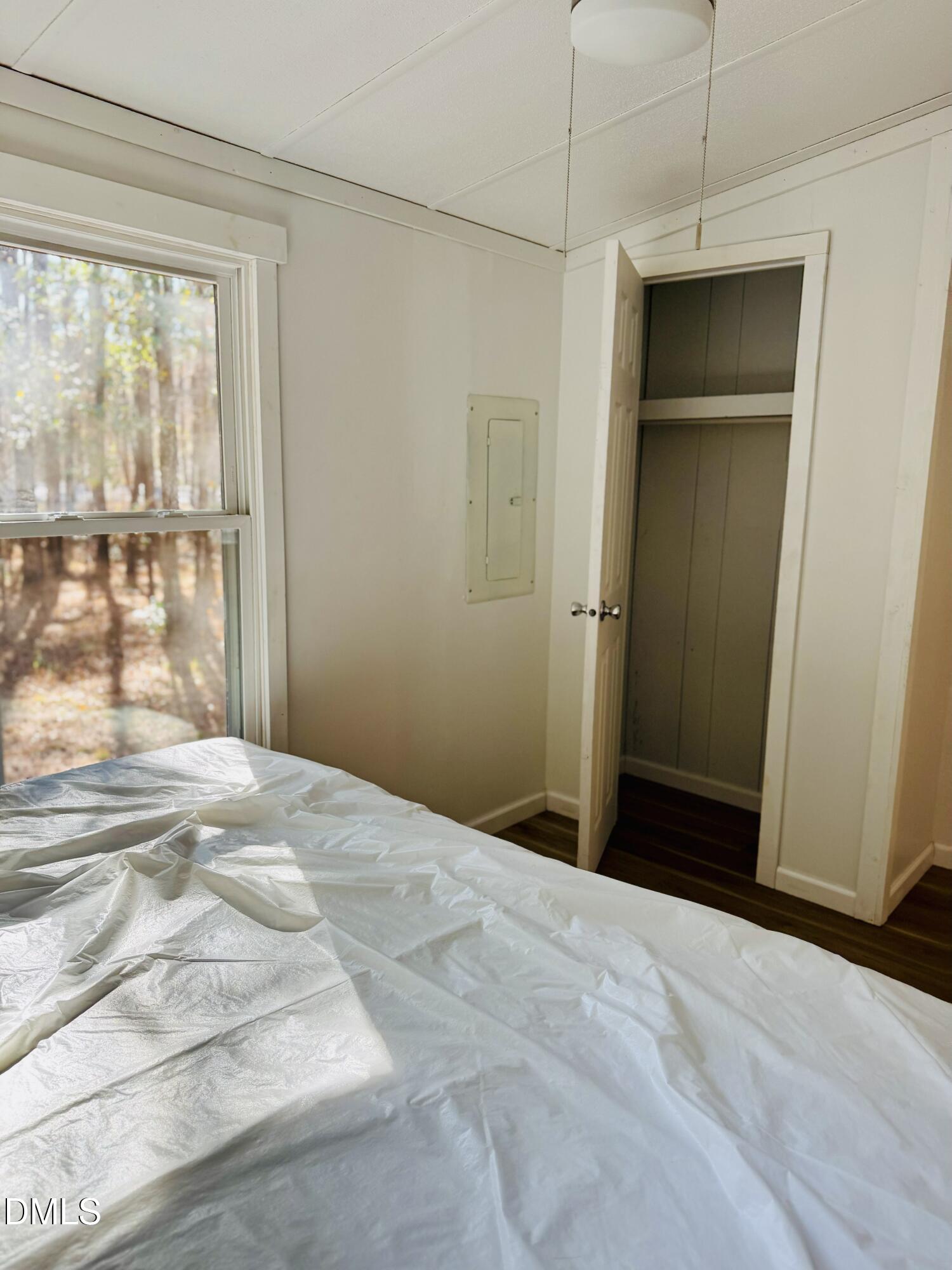 3280 Lakebay Road Vass, NC 28394 - Photo 22 of 41 a bedroom with a bed and a window
