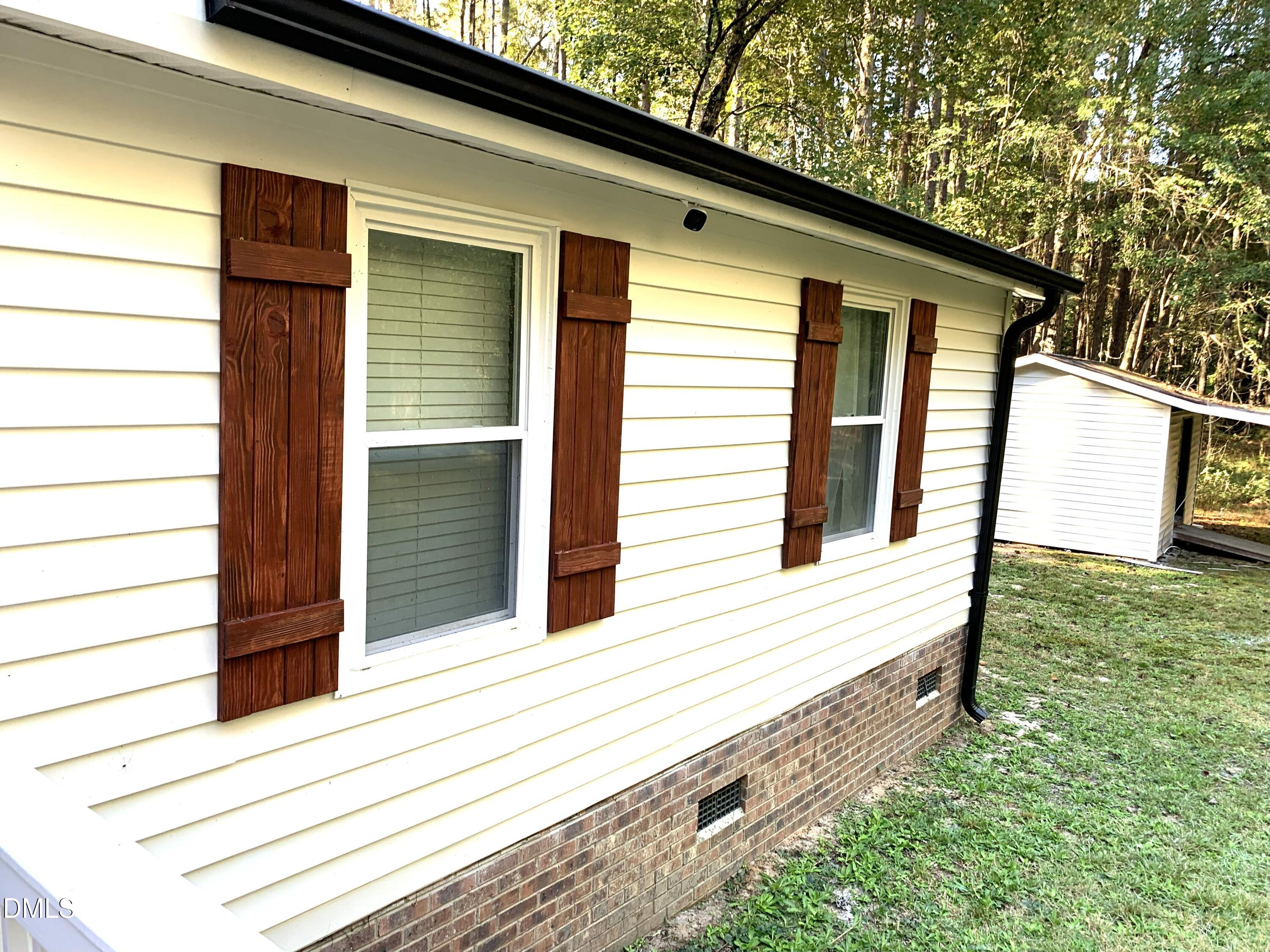 3280 Lakebay Road Vass, NC 28394 - Photo 3 of 41 a view of a house with a large window