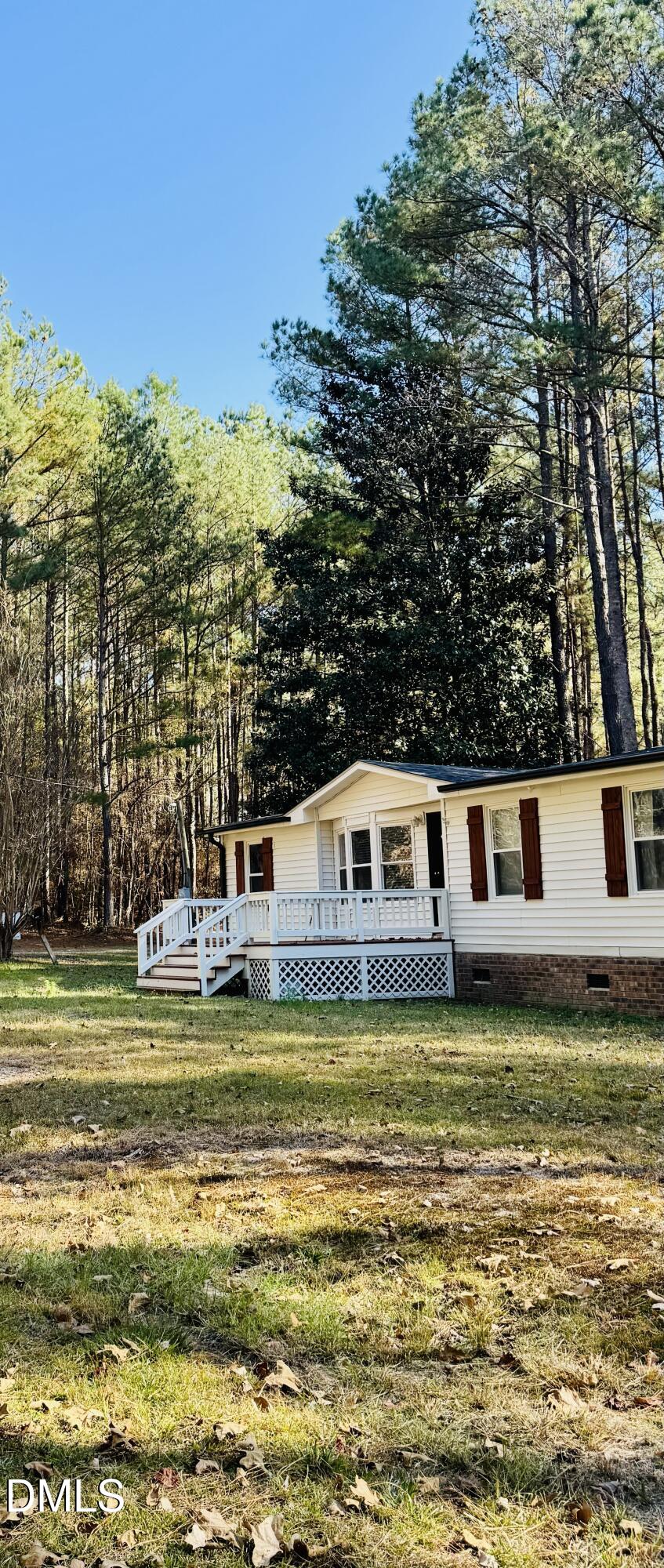 3280 Lakebay Road Vass, NC 28394 - Photo 40 of 41 a view of a swimming pool with an ocean view