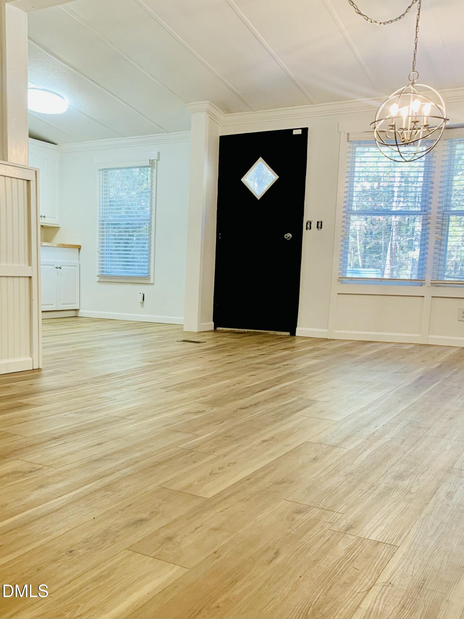 3280 Lakebay Road Vass, NC 28394 - Photo 6 of 41 a view of an empty room with a window