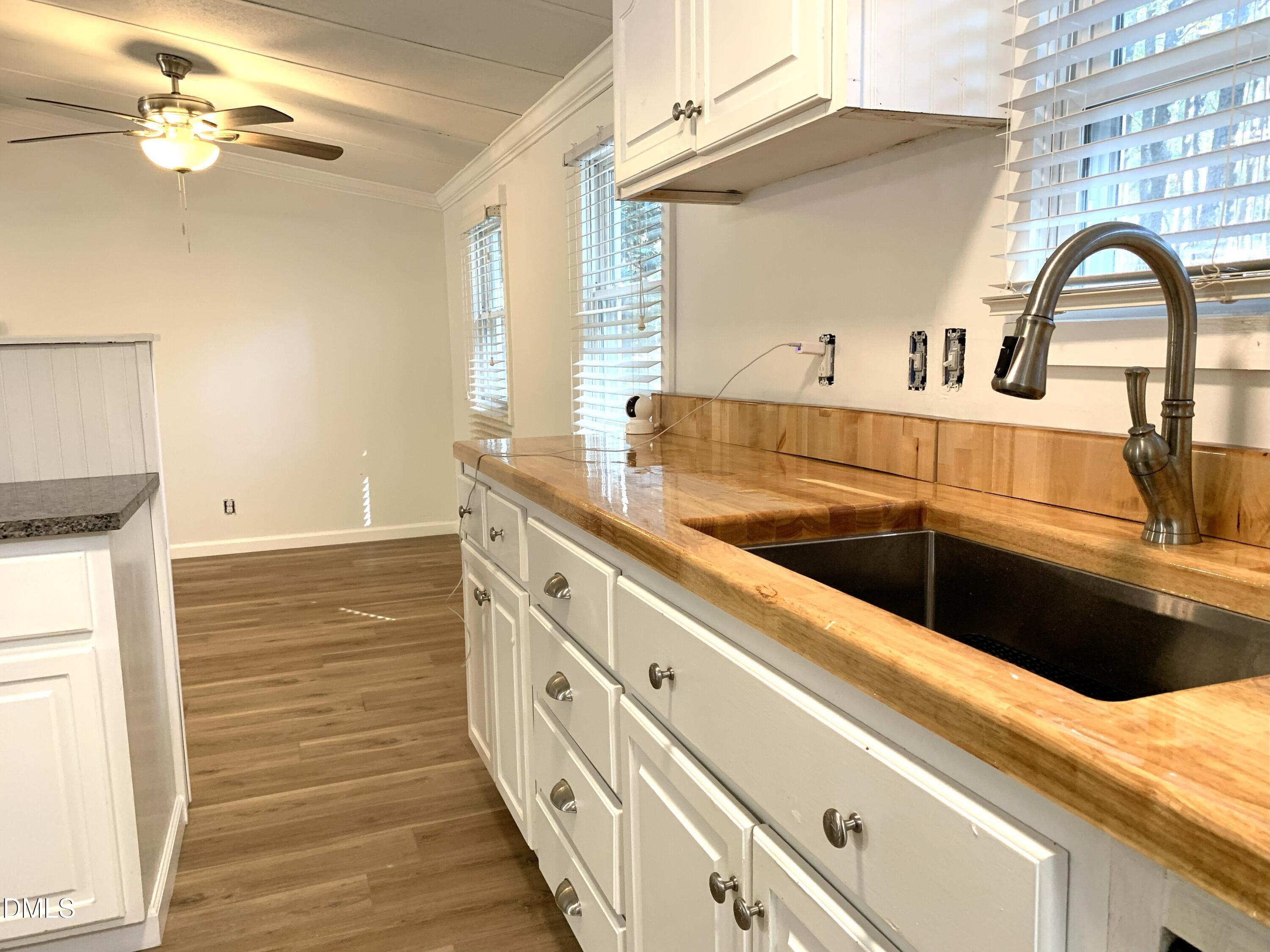 3280 Lakebay Road Vass, NC 28394 - Photo 9 of 41 a bathroom with a sink a mirror and a bathtub