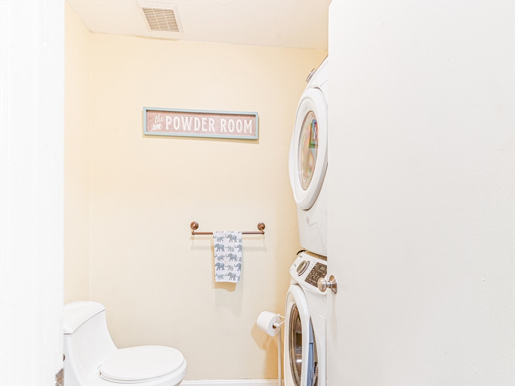 945 Riverside Drive, Unit 2A Methuen, MA 01844 - Photo 17 of 39 a bathroom with a toilet and a mirror