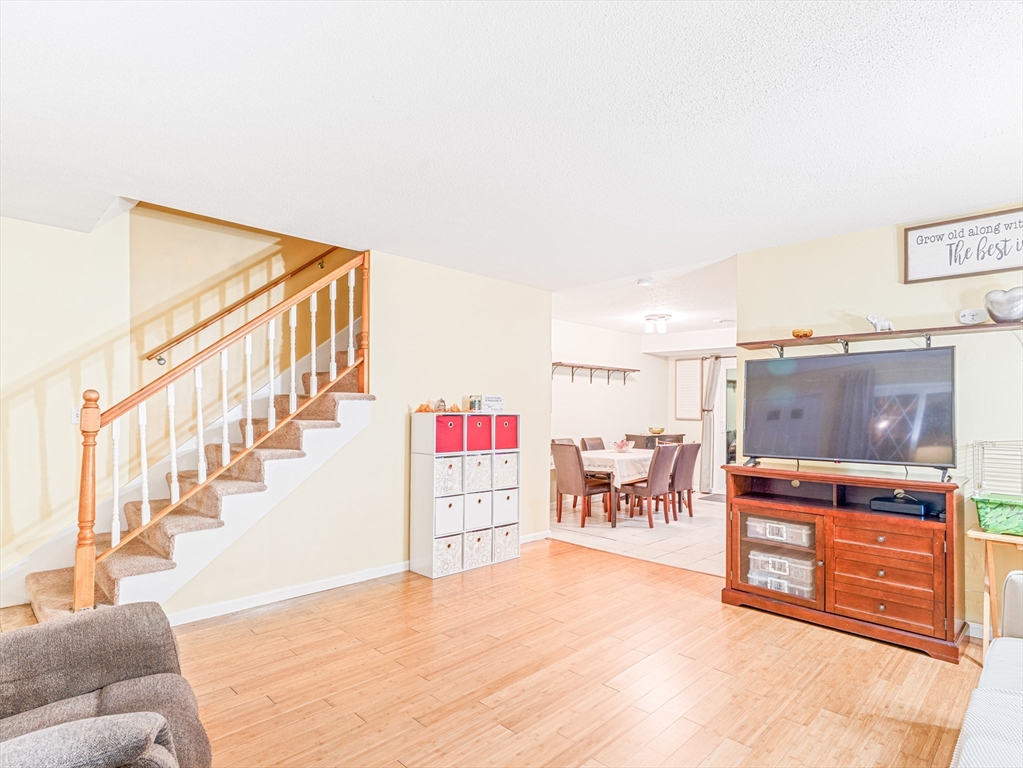 945 Riverside Drive, Unit 2A Methuen, MA 01844 - Photo 19 of 39 a view of a hallway with seating area