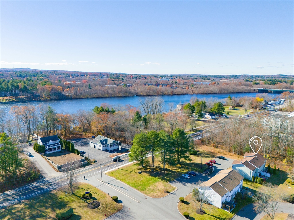 945 Riverside Drive, Unit 2A Methuen, MA 01844 - Photo 36 of 39 an aerial view of a house with a yard