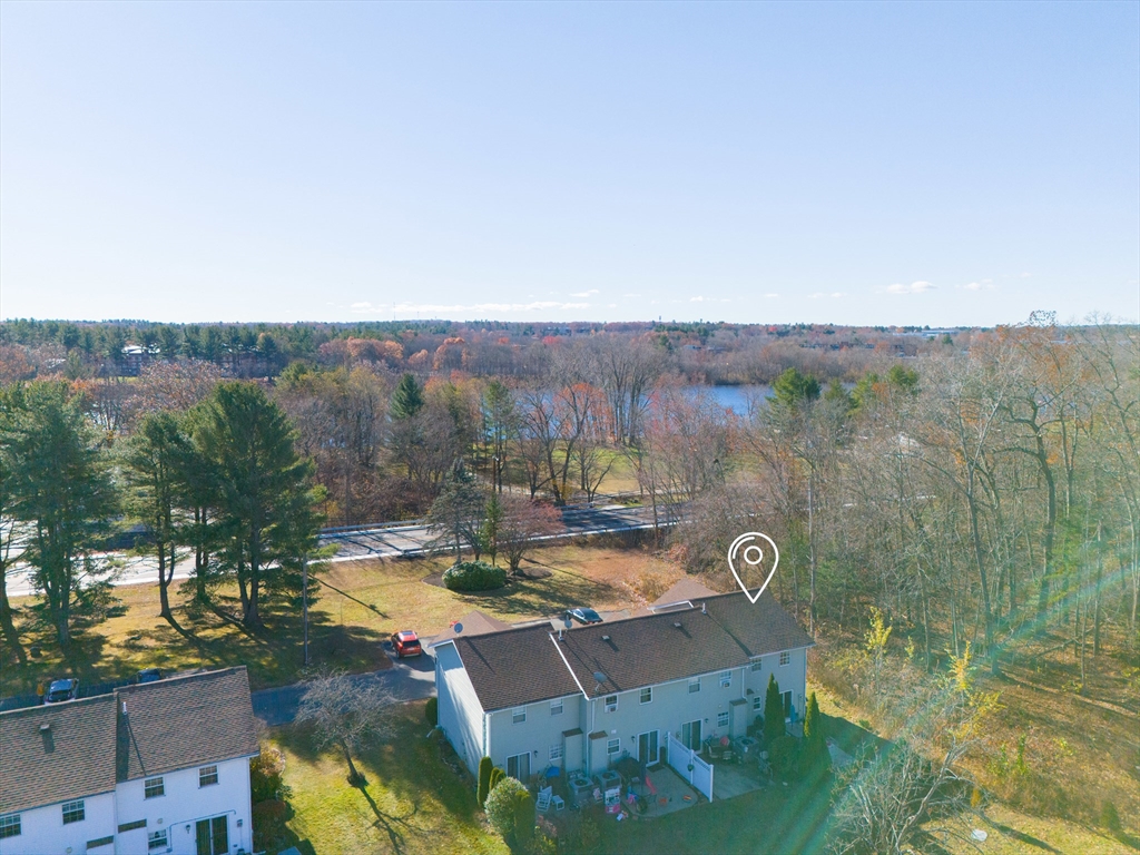 945 Riverside Drive, Unit 2A Methuen, MA 01844 - Photo 38 of 39 a view of a lake in middle of the town