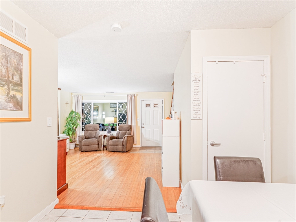 945 Riverside Drive, Unit 2A Methuen, MA 01844 - Photo 7 of 39 a living room with furniture and a large window