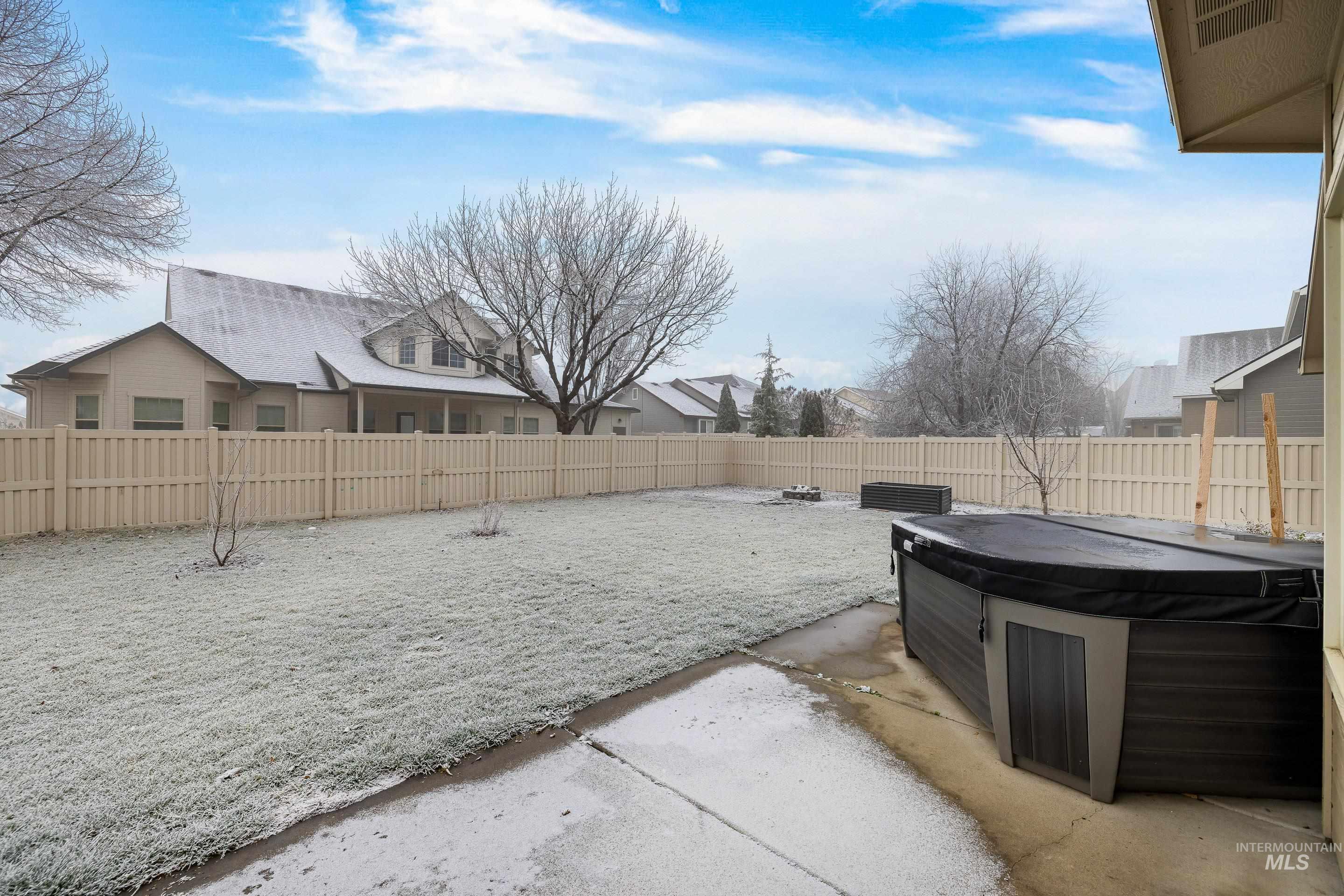 2578 South Groom Way Meridian, ID 83642 - Photo 34 of 39 Fenced backyard with a patio, a hot tub, and a residential view