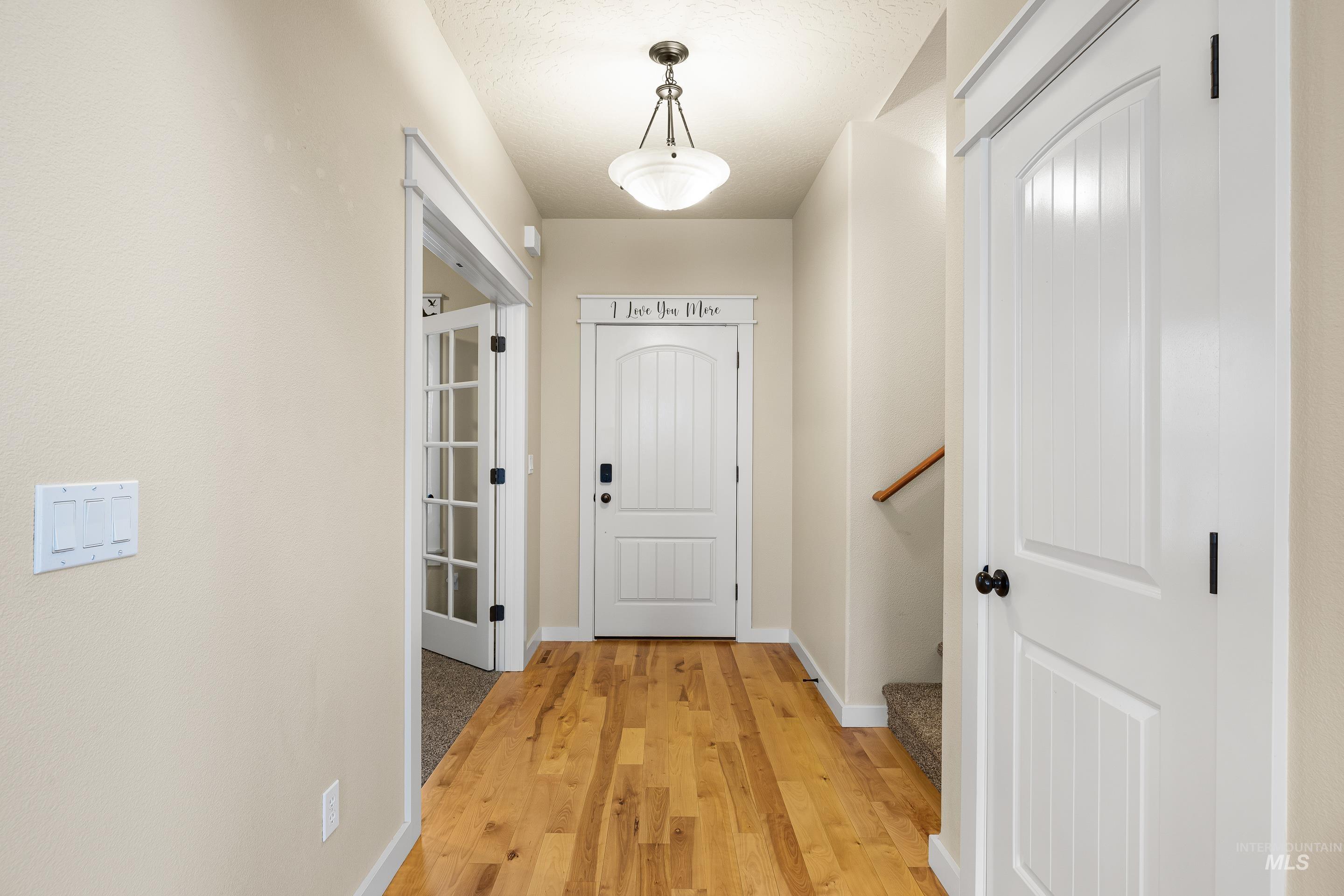 2578 South Groom Way Meridian, ID 83642 - Photo 4 of 39 Doorway featuring wood finished floors and stairs