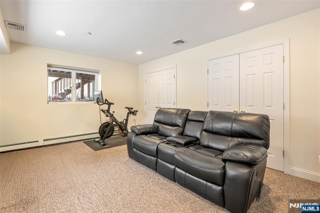 682 Greeley Avenue, Unit A Fairview, NJ 07022 - Photo 21 of 23 a living room with furniture