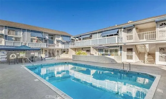 a front view of a house with swimming pool