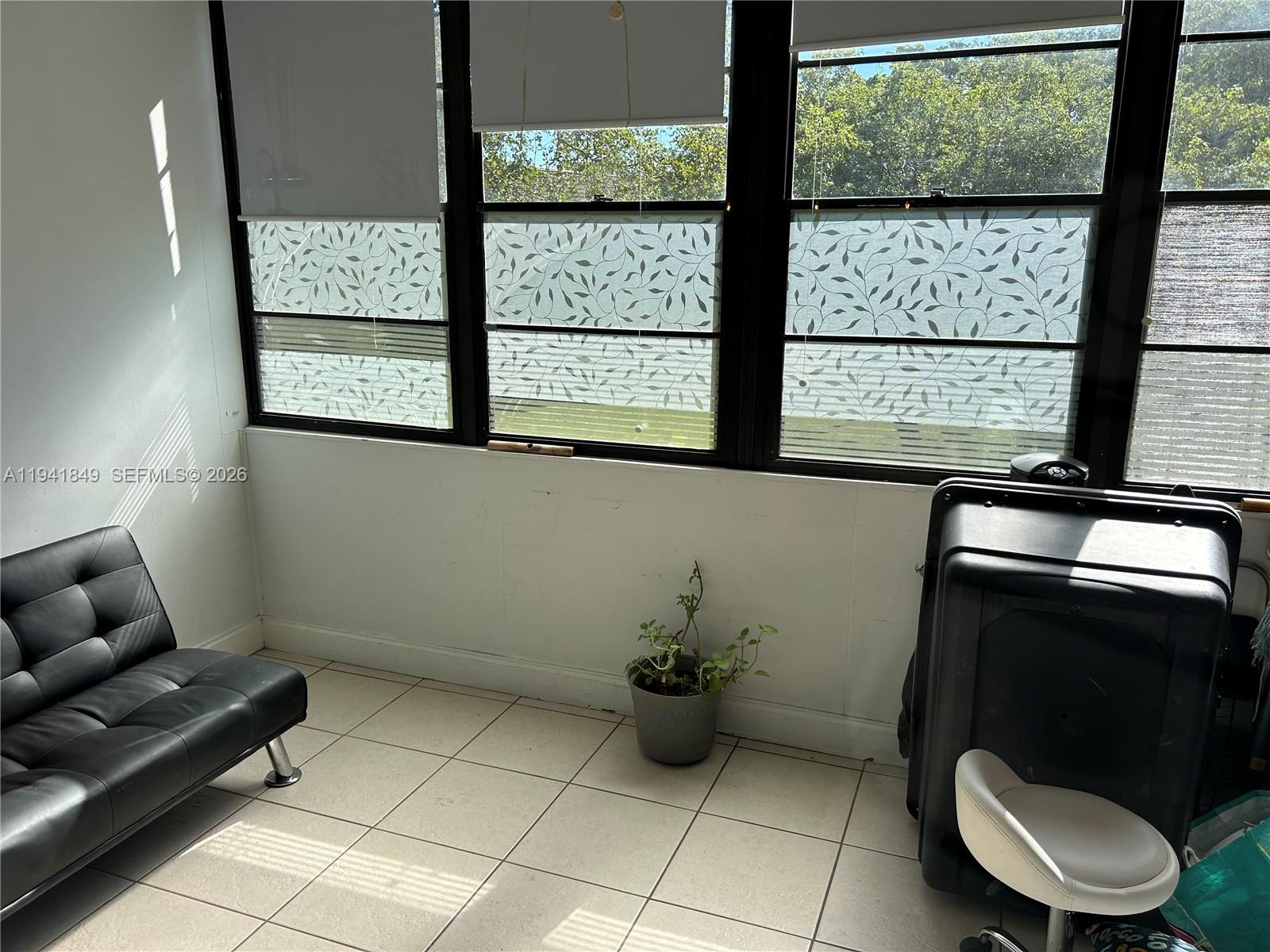 200 Gate Road, Unit 207 Hollywood, FL 33024 - Photo 14 of 38 a bathroom with a toilet and a sink