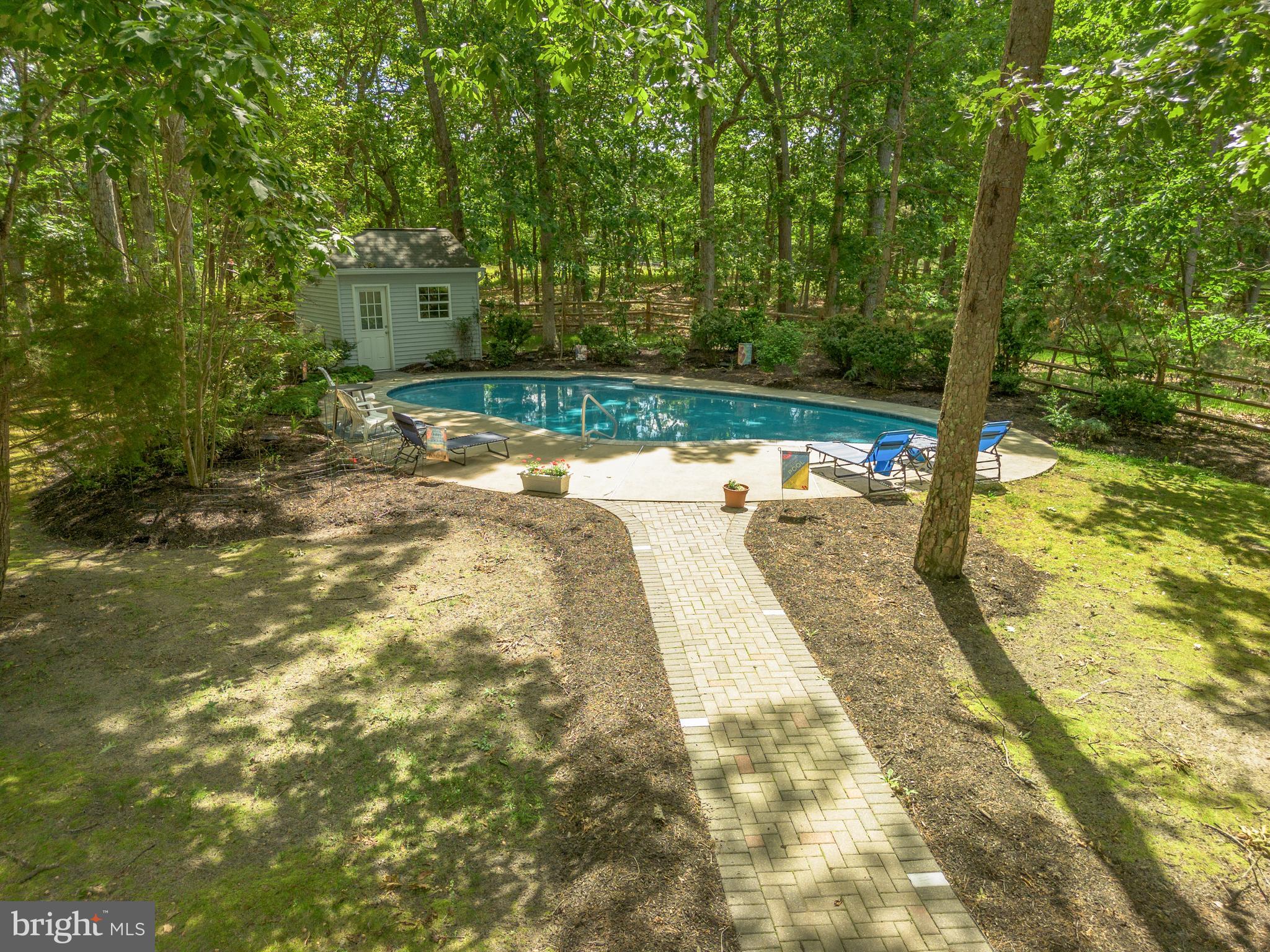 581 McKendimen Road Medford, NJ 08055 - Photo 5 of 34 a view of swimming pool with a patio