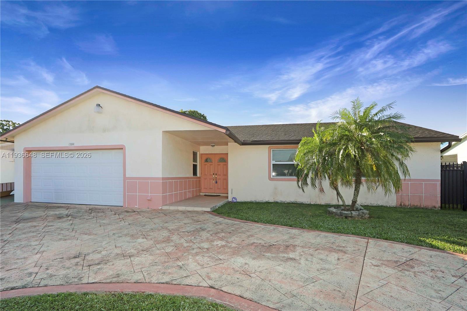 13244 Southwest 255th Terrace Homestead, FL 33032 - Photo 1 of 22 a view of a house with a yard