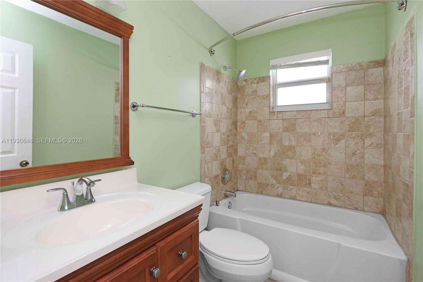 13244 Southwest 255th Terrace Homestead, FL 33032 - Photo 15 of 22 a bathroom with a sink a toilet and shower