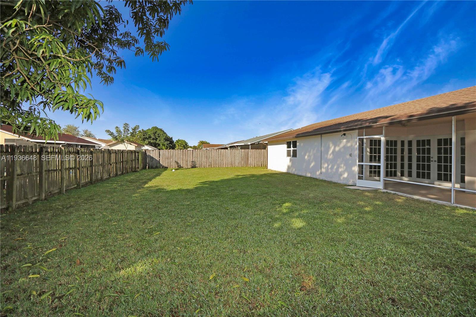 13244 Southwest 255th Terrace Homestead, FL 33032 - Photo 20 of 22 a view of a backyard