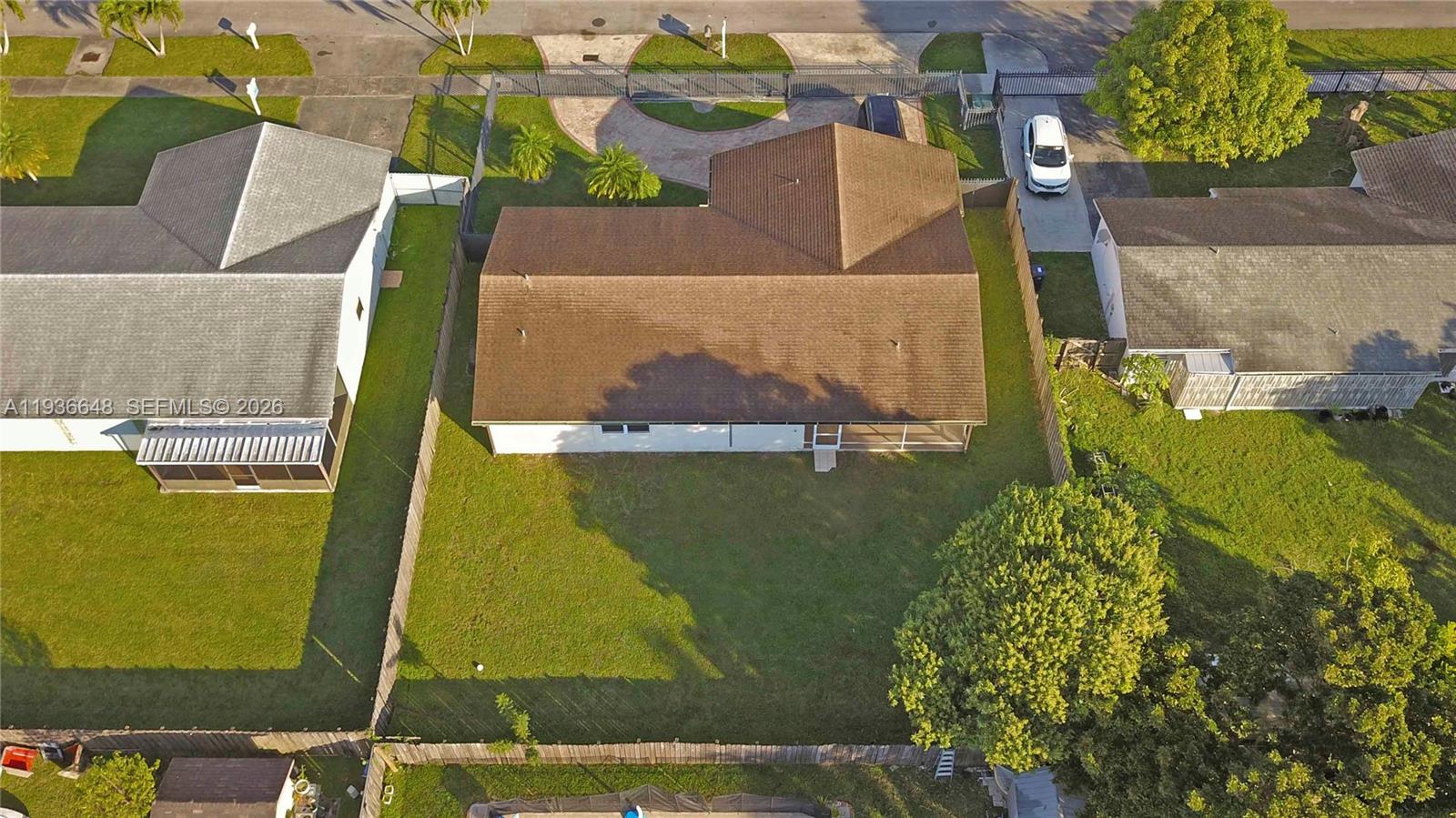 13244 Southwest 255th Terrace Homestead, FL 33032 - Photo 22 of 22 an aerial view of a house with a swimming pool