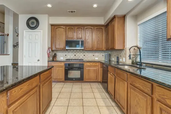 $565,000 | 2312 Tawny Owl Road, Grand Prairie, TX 75052