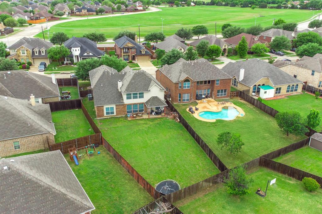 2312 Tawny Owl Road Grand Prairie, TX 75052 - Photo 39 of 40 Aerial view of residential area with a local golf course