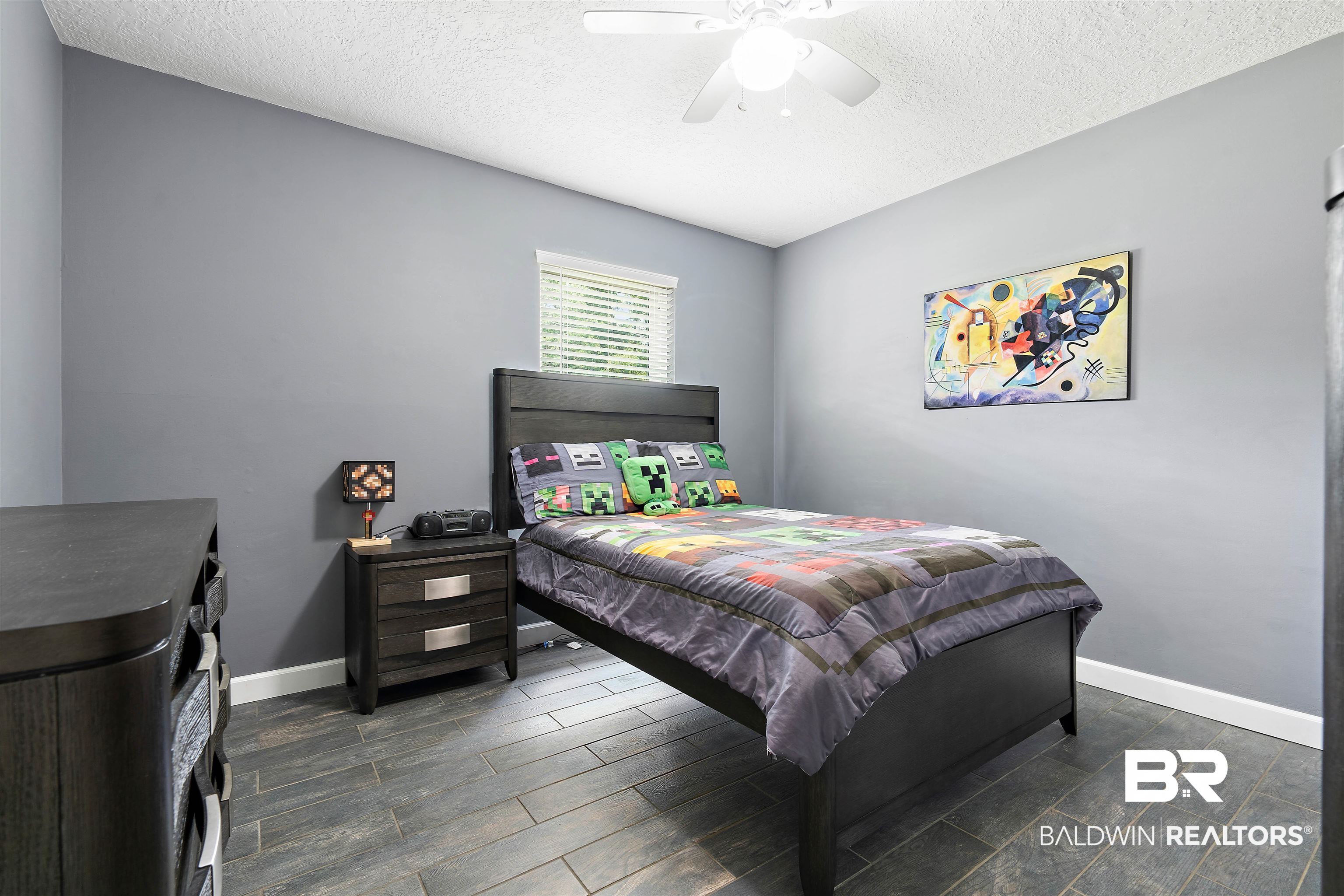 2000 Campfire Drive Semmes, AL 36575 - Photo 18 of 26 Bedroom featuring a textured ceiling and ceiling fan