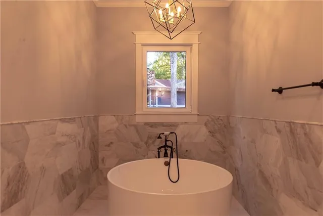 a bathroom with a sink and a window