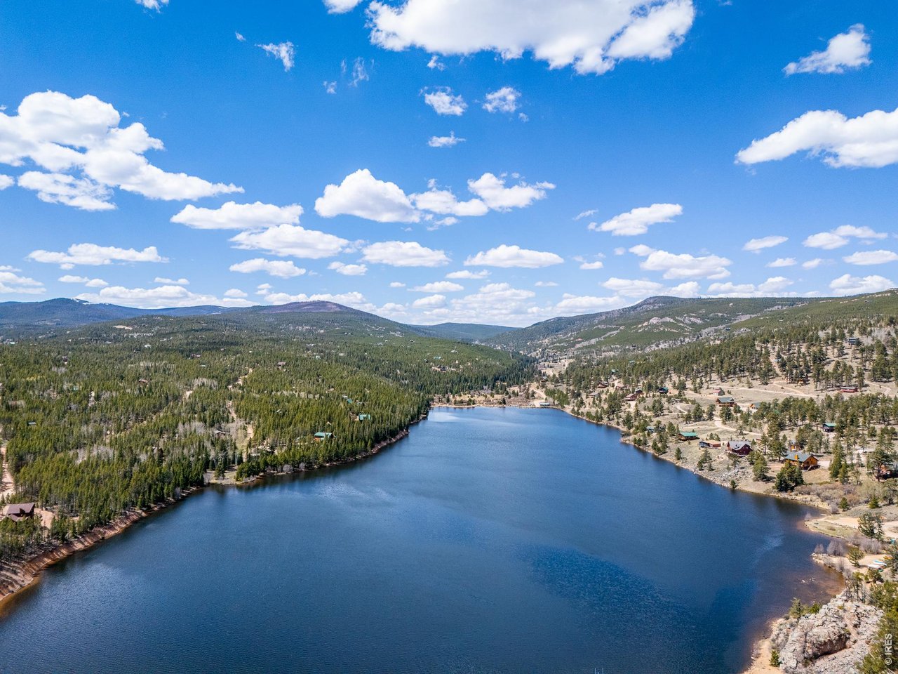 20 Inca Court Red Feather Lakes, CO 80545 - Photo 23 of 23 a view of a lake from a city