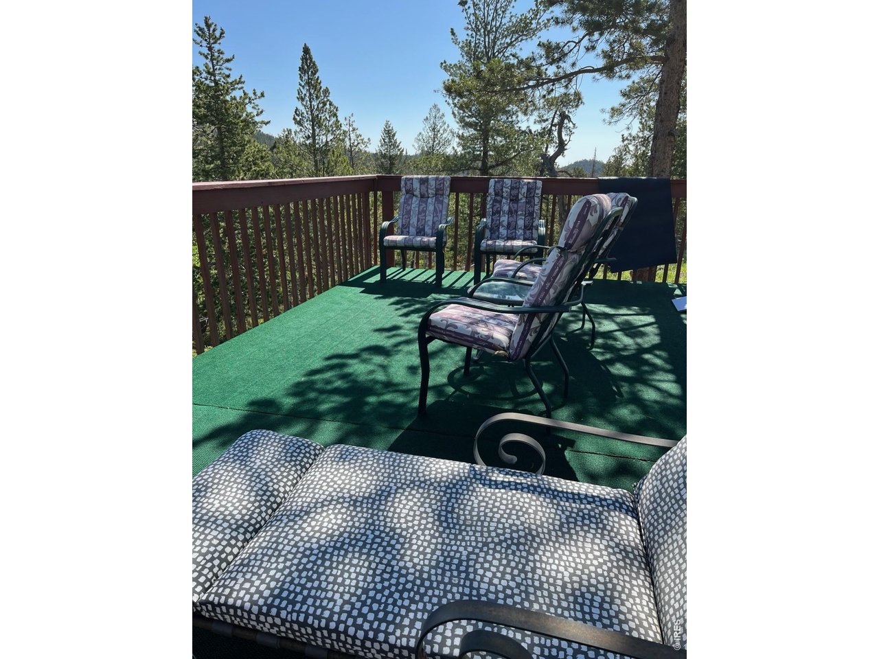 20 Inca Court Red Feather Lakes, CO 80545 - Photo 5 of 23 a view of a chair and table in the roof